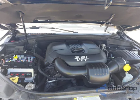 2012 Jeep Grand Cherokee Overland из США, поврежденный, VIN 1C4RJECG6CC354845